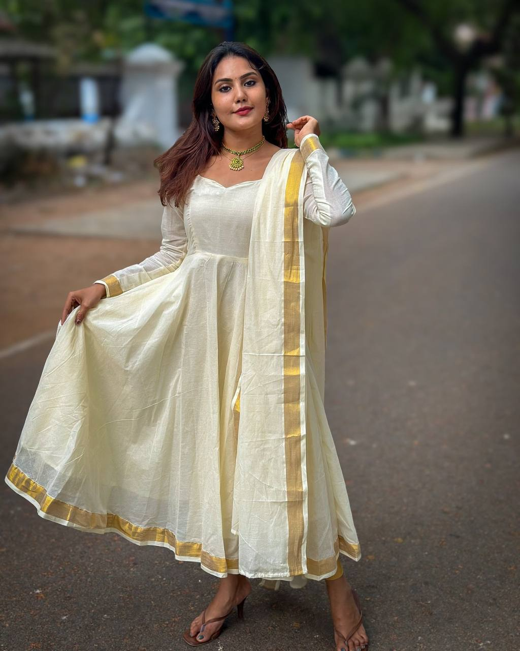 South Silk Traditional Cream and Golden Onam Cotton Anarkali Suit